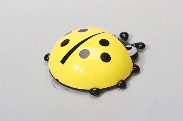 Multifunctional toothbrush holder in the shape of Ladybug