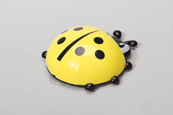 Multifunctional toothbrush holder in the shape of Ladybug